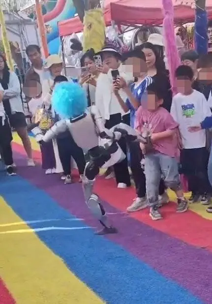 Robot kicking a chil;d