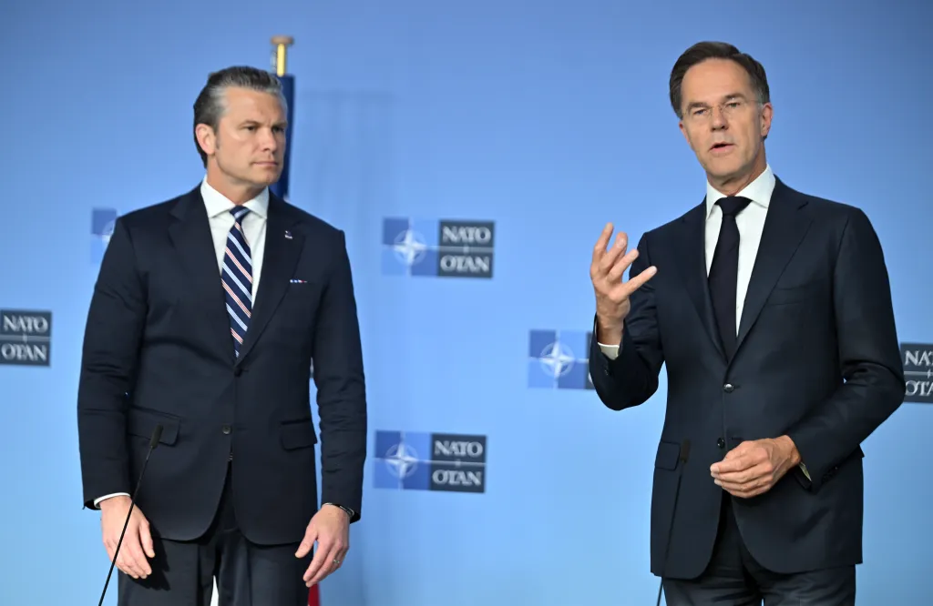 US War Secretary Pete Hegseth and NATO Secretary General Mark Rutte deliver joint statements at NATO Headquarters on June 18, 2026.
