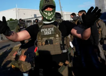 Car drives into protest line outside ICE detention center as tensions boil over