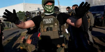 Car drives into protest line outside ICE detention center as tensions boil over