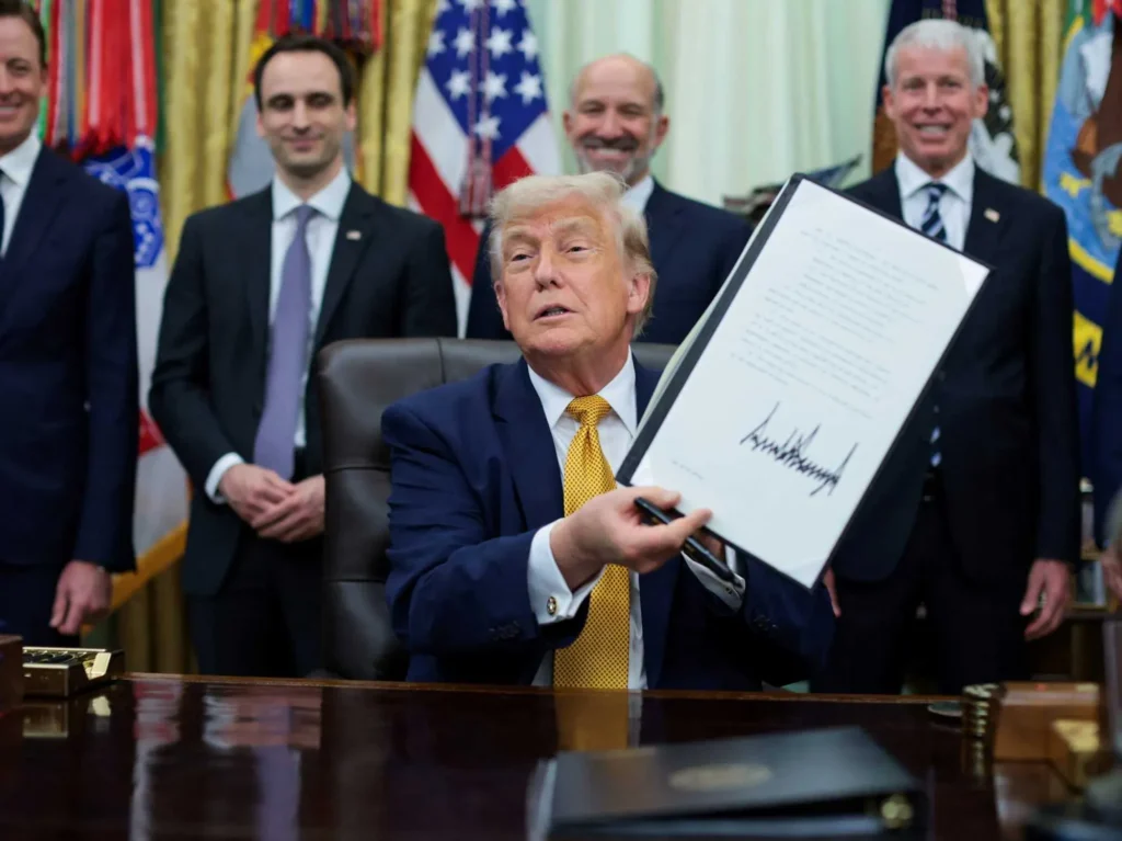 Confused Trump raises eyebrows as he stumbles through order-signing on ‘crypto-graffey’