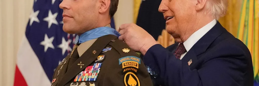 Observers baffled as Trump struggles to clasp Medal of Honor around veteran