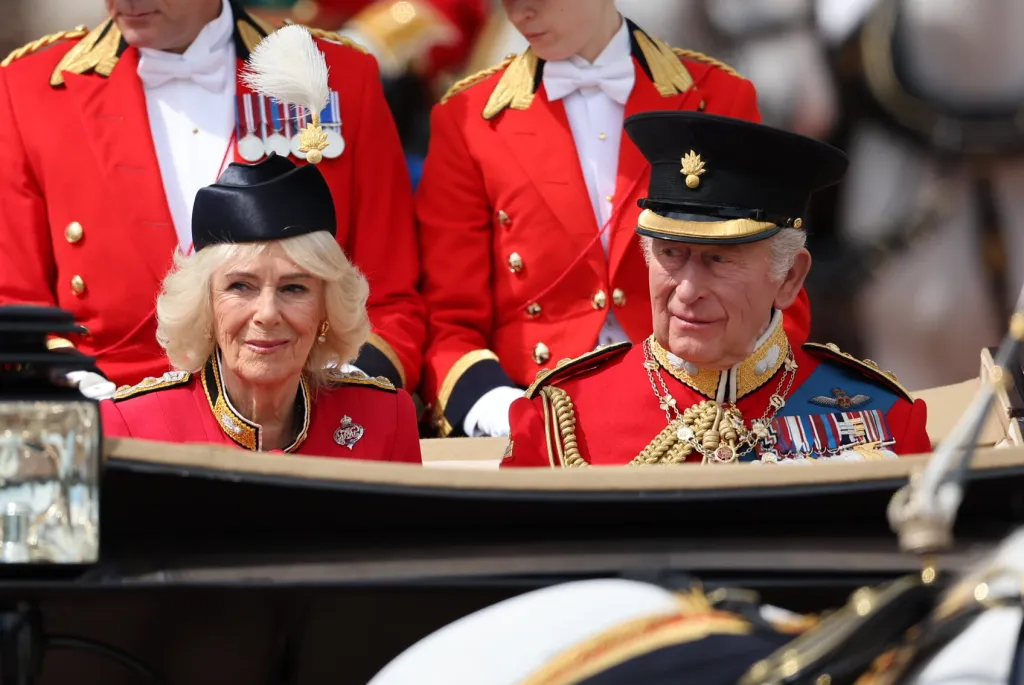 King Charles III and Queen Camilla in a carriage at Trooping the Colour.