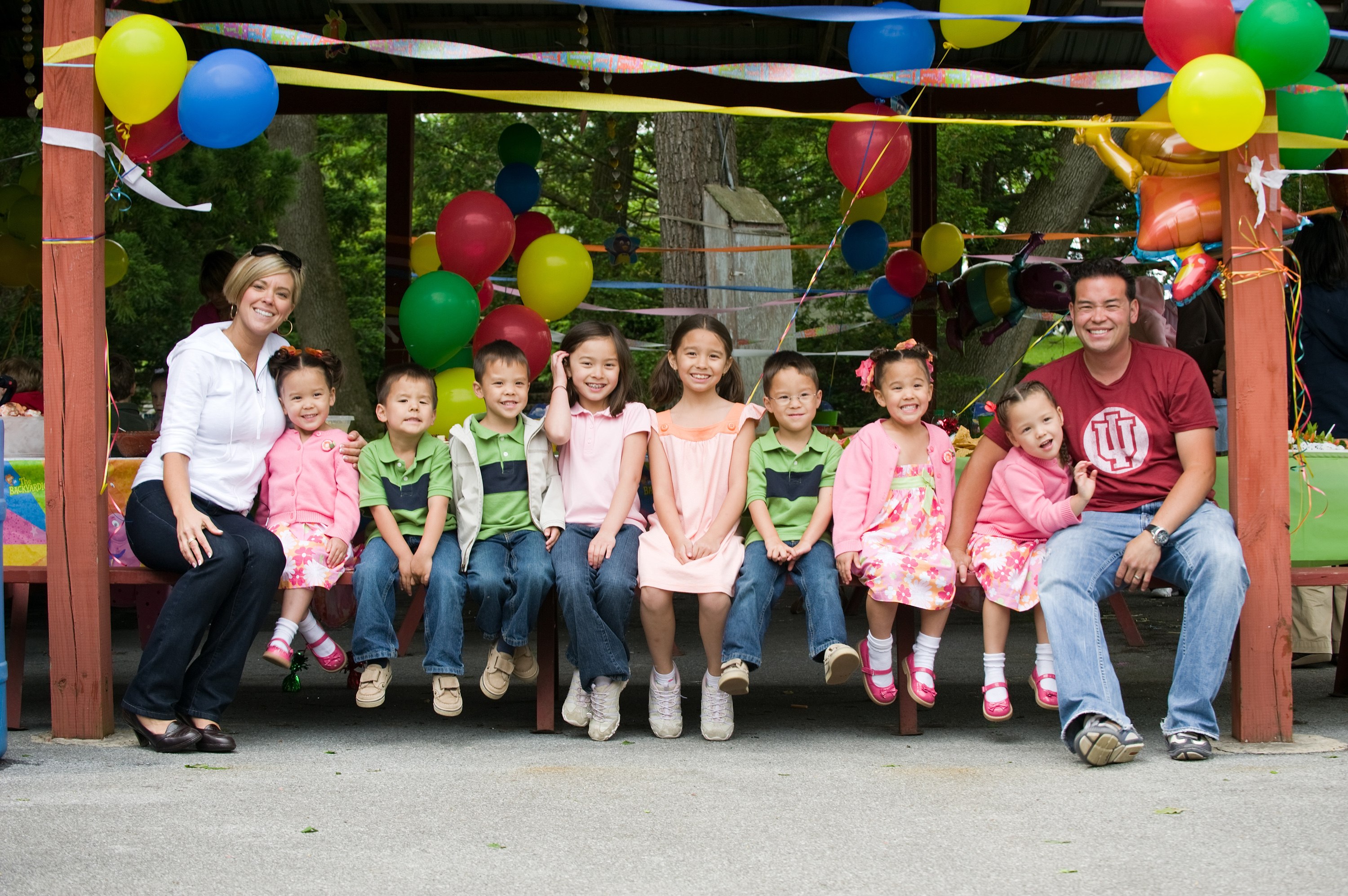 Jon and Kate Gosselin with their eight children (twins and sextuplets) at a party.