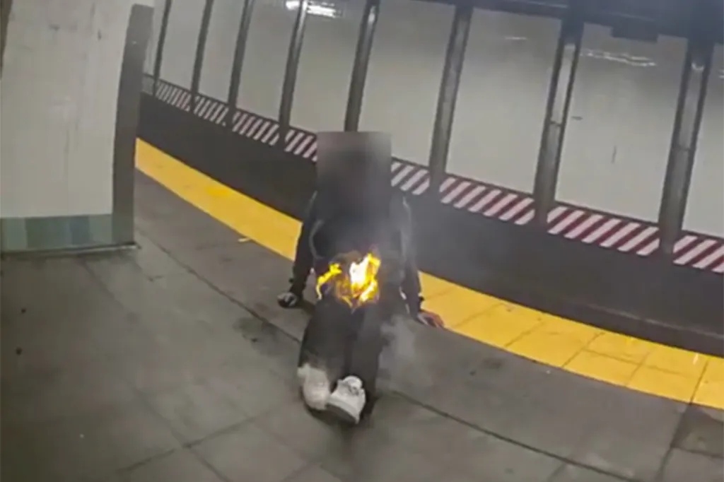 A homeless man is engulfed in flames after being set on fire by Hiram Carrero at the Penn Station subway stop on Dec. 1, 2025.