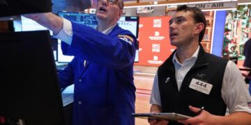 Wall Street drifts to a mixed finish after Micron soars and Apple drops