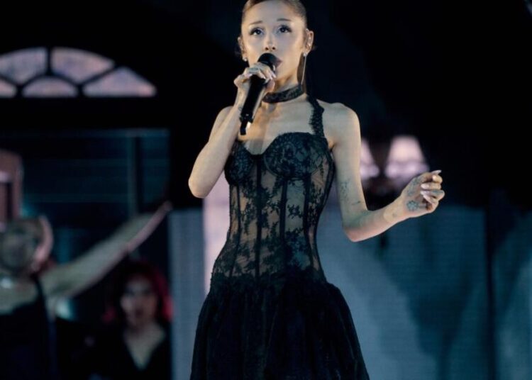 Ariana Grande returns to the stage, pop-star quirks intact