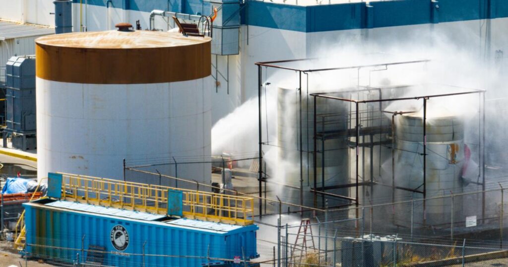 The FBI serves a search warrant at the Garden Grove chemical plant