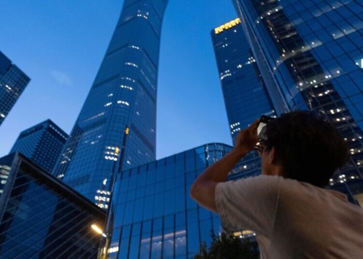 Small aircraft crashes into Beijing’s tallest building, according to reports