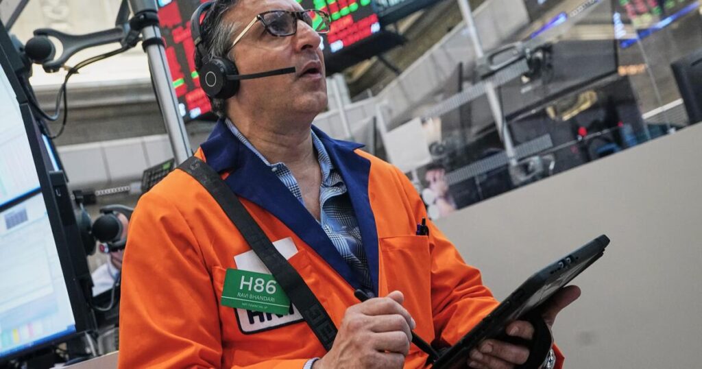 The Dow leaps to a record as oil prices ease and stocks outside of AI rally