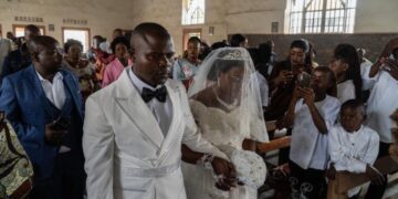 Celebrating a wedding amid the Ebola outbreak: No kisses or close contact, but love lives here