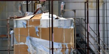 50 gallons of water spill into storm drain at site of O.C. chemical crisis, testing underway