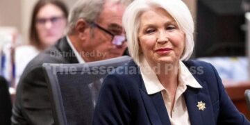 Colorado elections clerk released from prison after governor commutes sentence