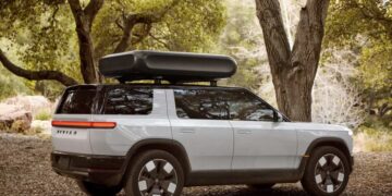 Rivian lays off hundreds of workers days after new vehicle deliveries begin