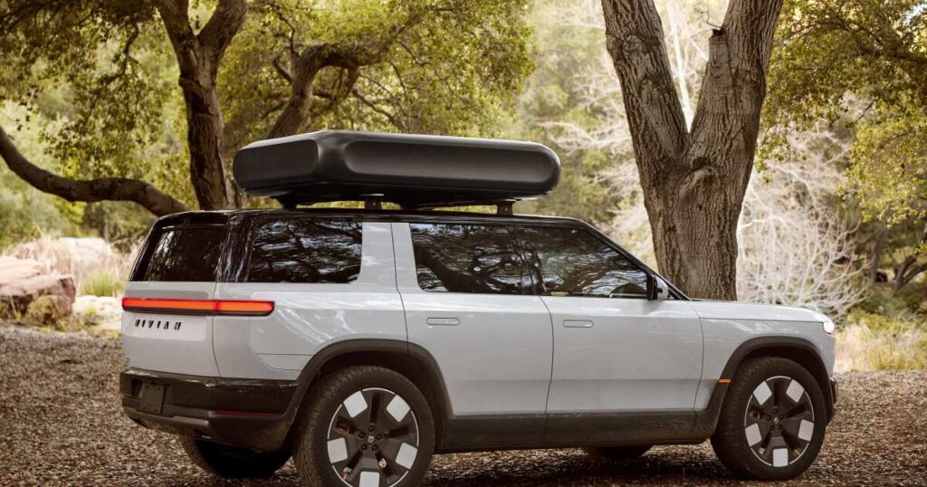 Rivian lays off hundreds of workers days after new vehicle deliveries begin