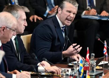 Pentagon chief lashes out at NATO allies and announces a review of U.S. forces in Europe