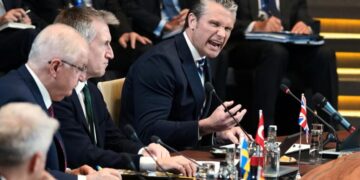 Pentagon chief lashes out at NATO allies and announces a review of U.S. forces in Europe