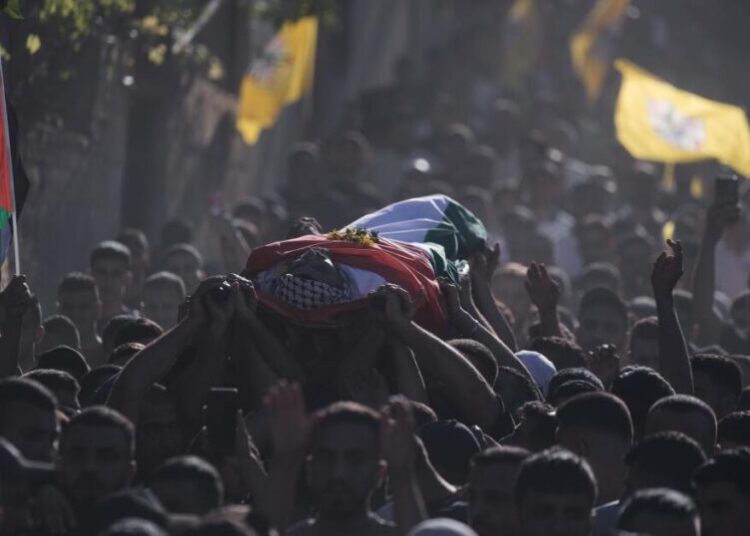 Palestinian man is shot and killed at a West Bank barrier near Jerusalem