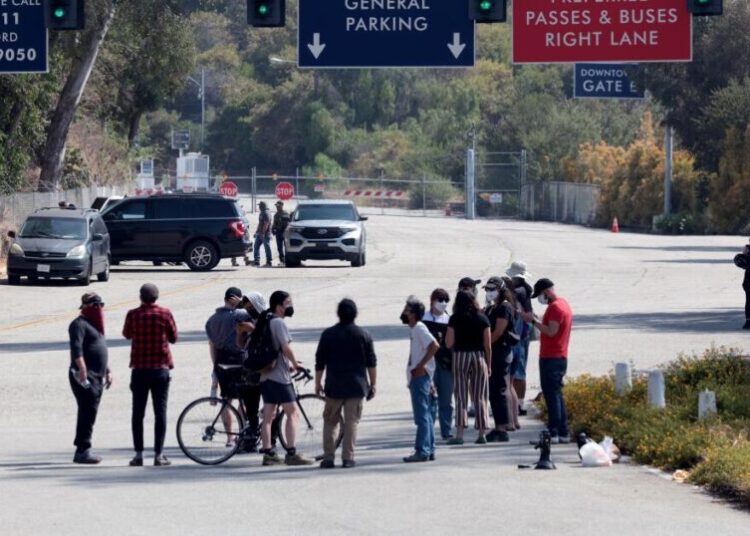 Dodgers fulfill $1-million pledge in response to ICE raids, owners divest from prison group
