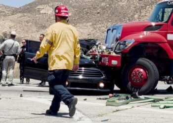 Two, including 10-year-old boy, killed in collision with speeding fire truck