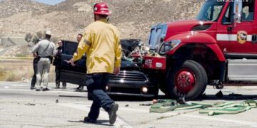 Two, including 10-year-old boy, killed in collision with speeding fire truck
