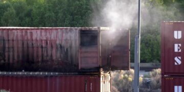 Rail car loaded with lithium batteries bursts into flames in Cajon Pass