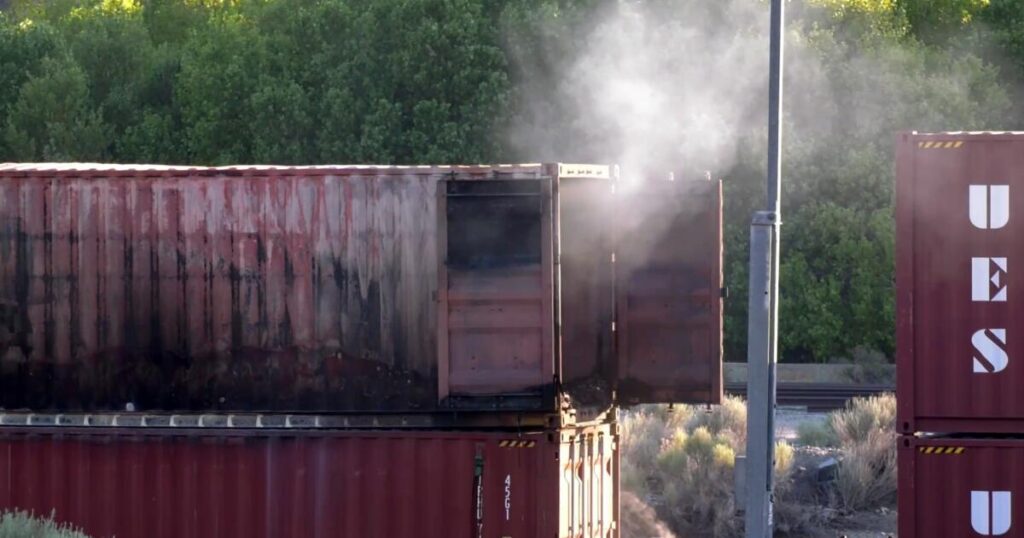Rail car loaded with lithium batteries bursts into flames in Cajon Pass