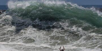 Historic swells continue to batter California beaches. When will the surf die down?