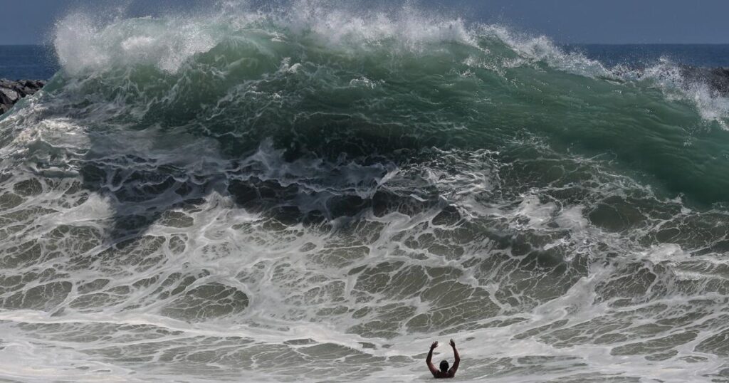 Historic swells continue to batter California beaches. When will the surf die down?
