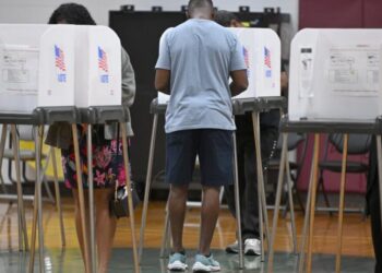 Federal judge bars Trump from implementing proof of citizenship requirement to vote