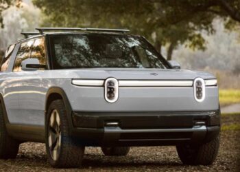 Rivian begins deliveries of cheaper electric vehicles