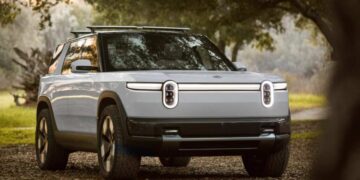 Rivian begins deliveries of cheaper electric vehicles