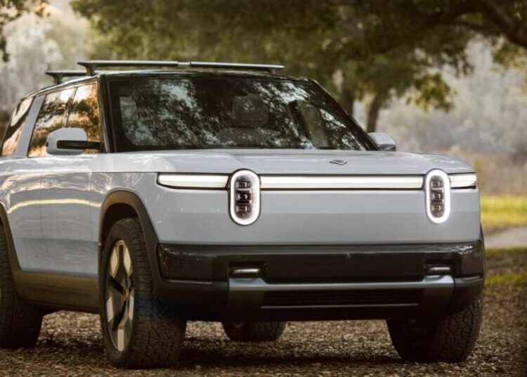Rivian begins deliveries of cheaper electric vehicles