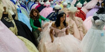 ‘We’re in survival mode’: A year after ICE raids, a couple fight to save their dress shops