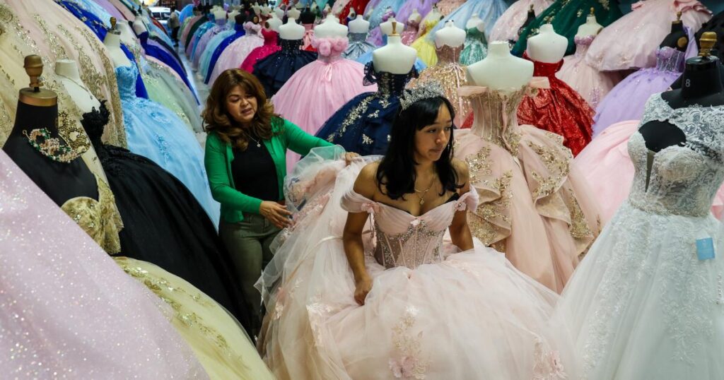 ‘We’re in survival mode’: A year after ICE raids, a couple fight to save their dress shops