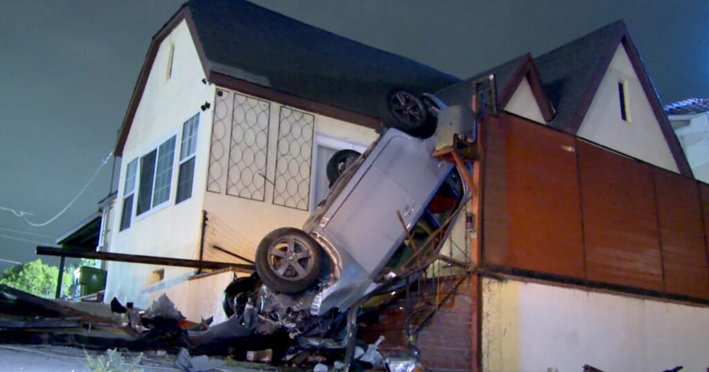 Car winds up upside down on the porch of a Wilmington home