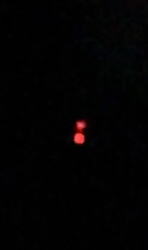 Image of a glowing red orb against a dark background.
