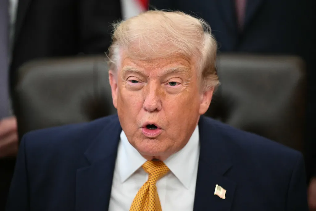 Donald Trump speaking in the Oval Office.