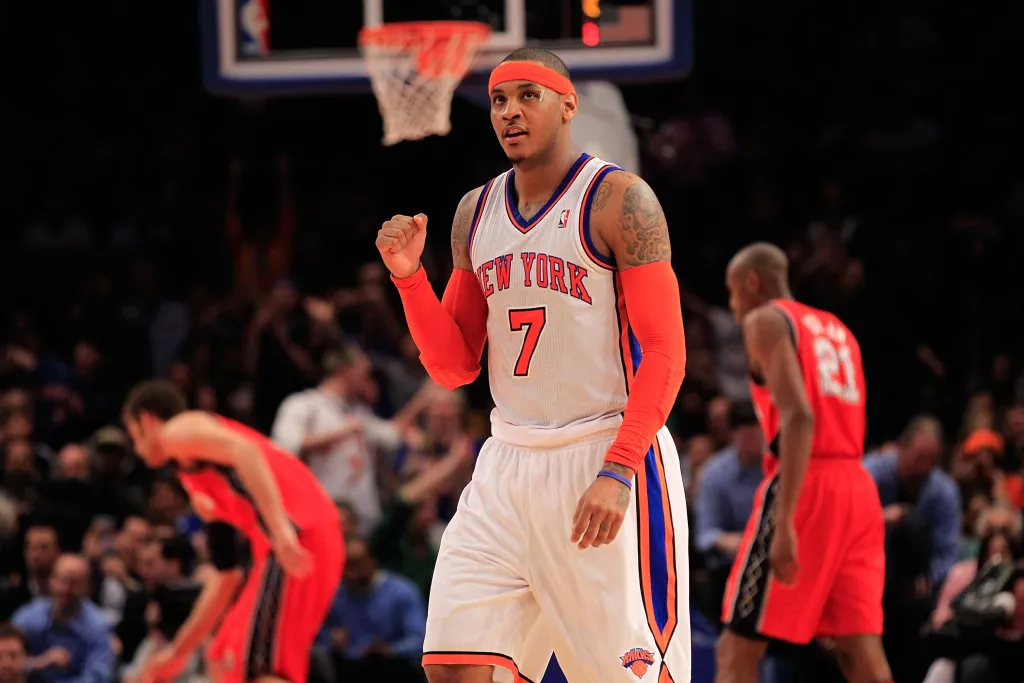 NBA player Carmelo Anthony celebrating on the court.