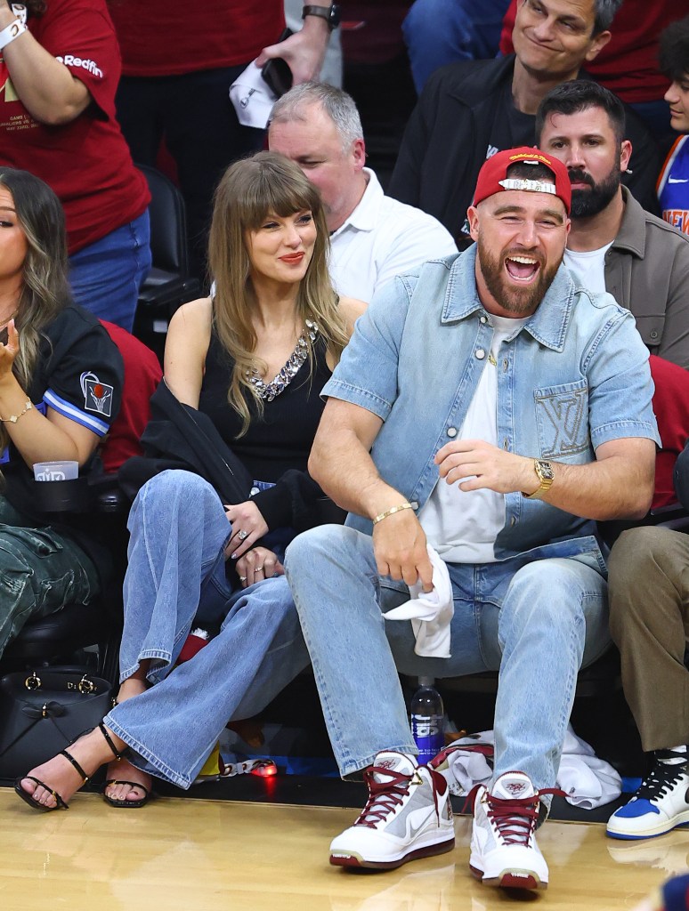 Taylor Swift and Travis Kelce attending a basketball game.
