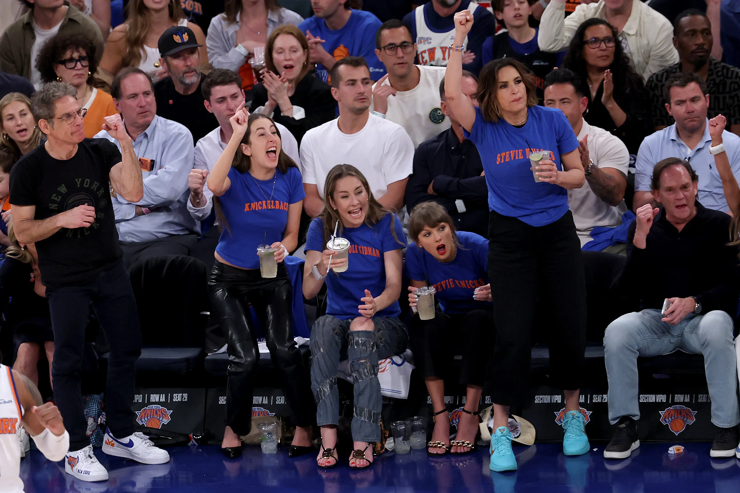 Alana Haim, Este Haim, Taylor Swift, and Mariska Hargitay reacting during Game Four of the 2026 NBA Finals.
