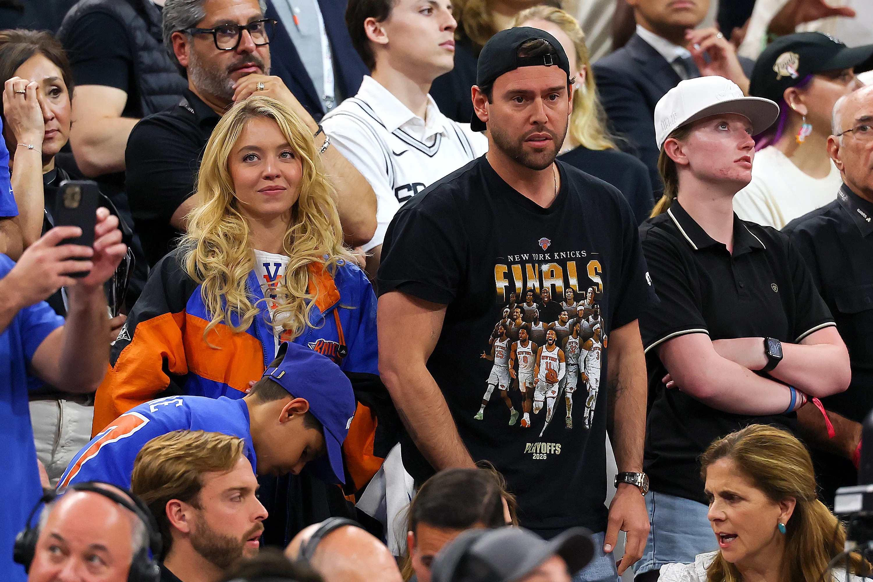 Sydney Sweeney and Scooter Braun watching Game Five of the 2026 NBA Finals.