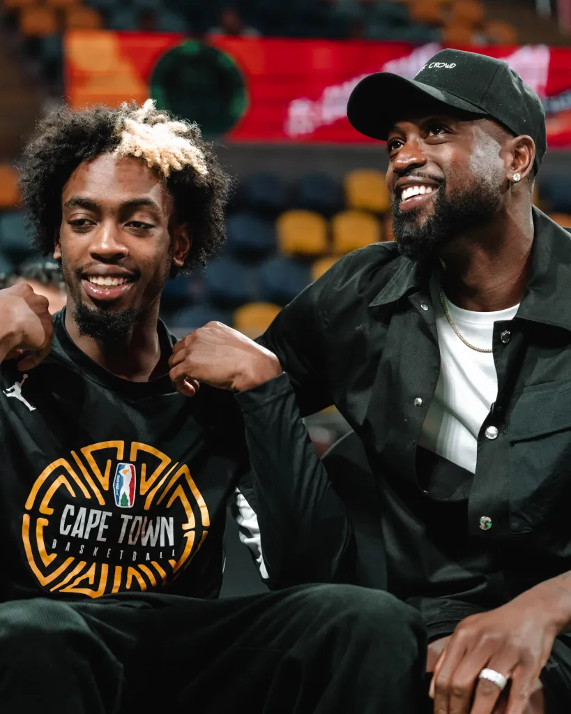 Zaire Wade of the Cape Town Tigers and Dwyane Wade before the game.