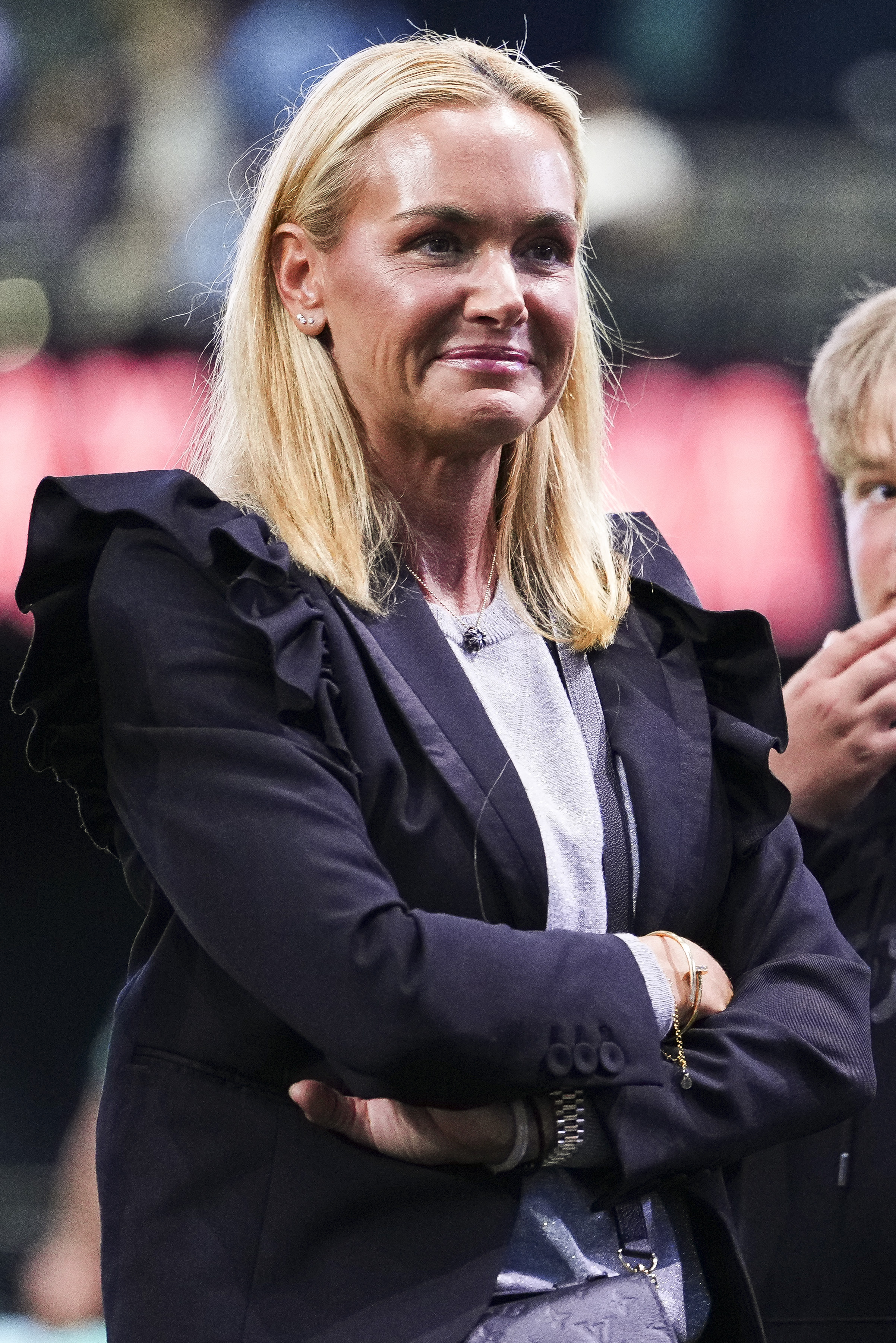 Vanessa Trump smiling at a TGL golf match.