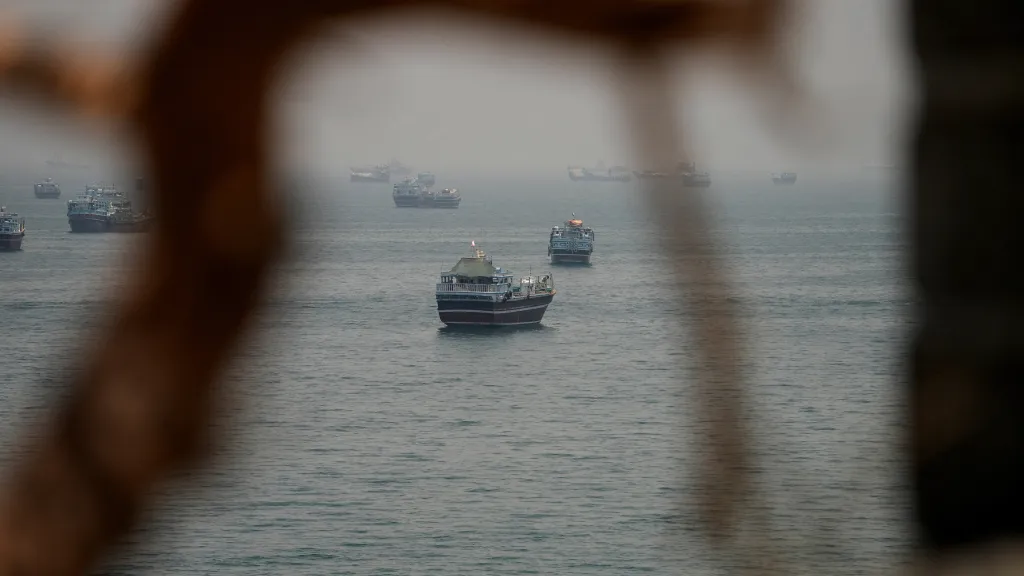 Vessels are anchored in the Strait of Hormuz, as seen from Musandam.
