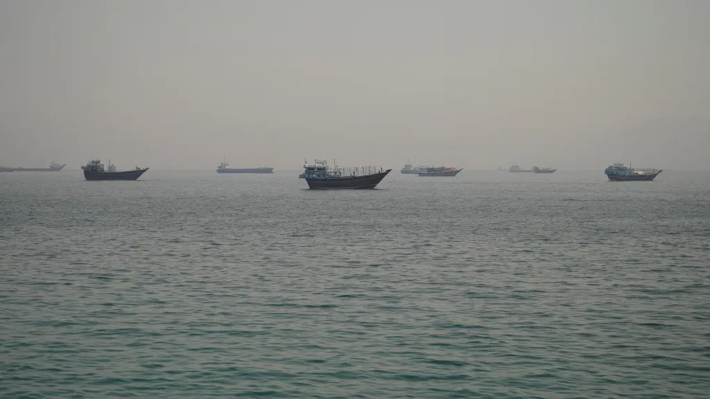 Vessels are anchored in the Strait of Hormuz, as seen from Musandam.