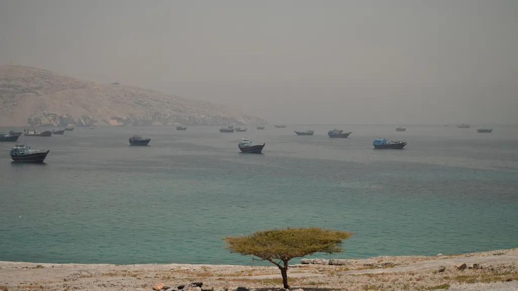 Vessels anchored in the Strait of Hormuz, seen from Musandam.