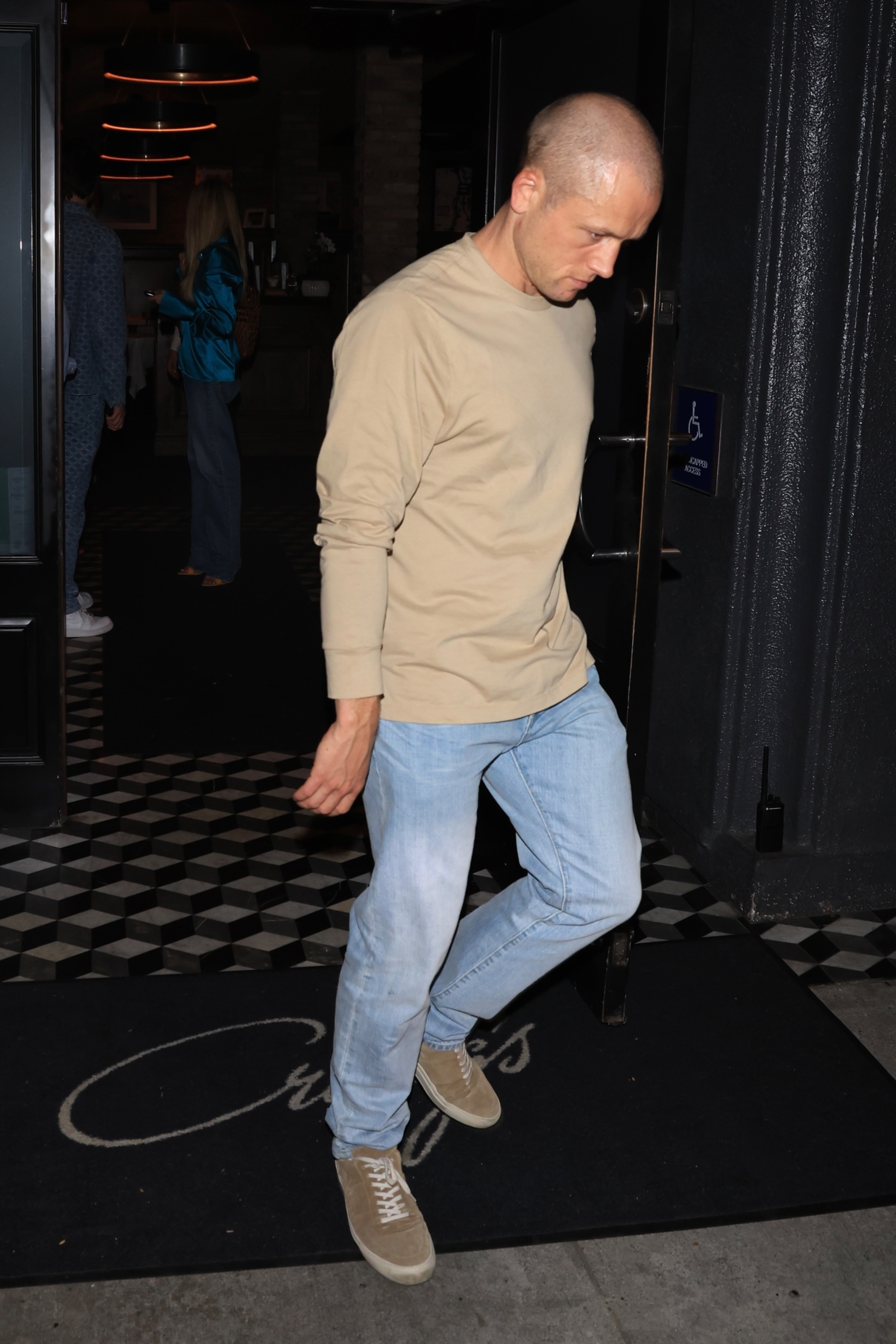 Taron Egerton exiting Craig's restaurant in West Hollywood.