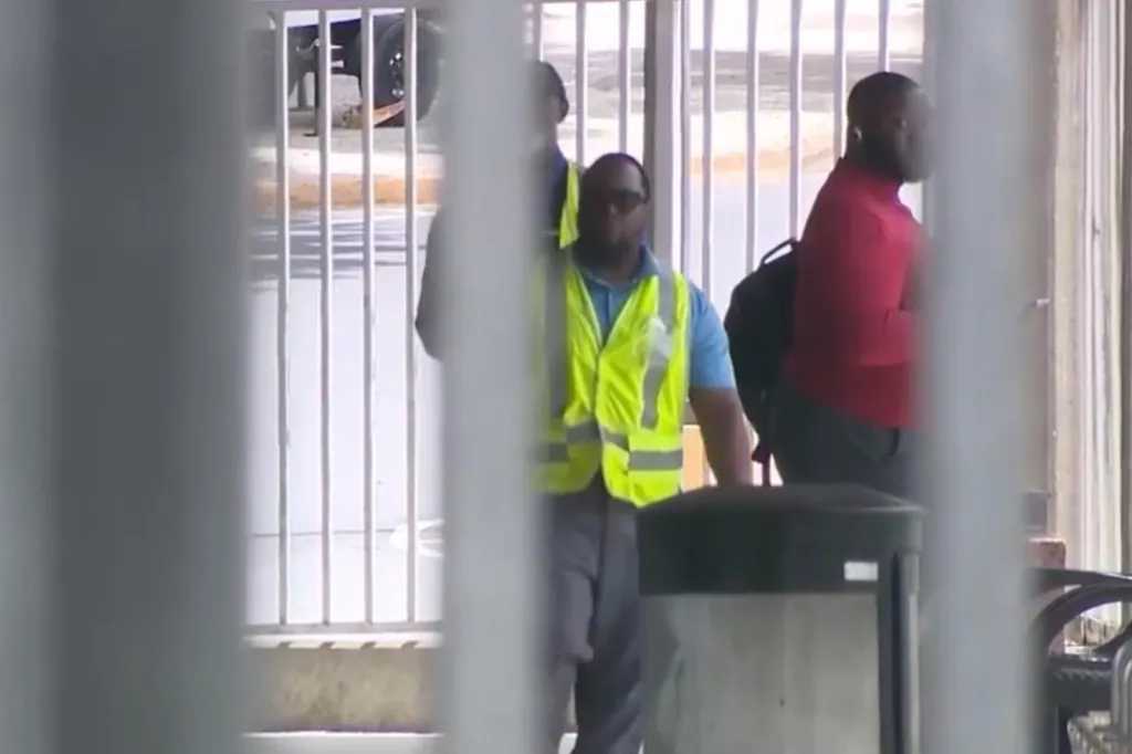 People at the scene after a woman was stabbed on a MARTA train.