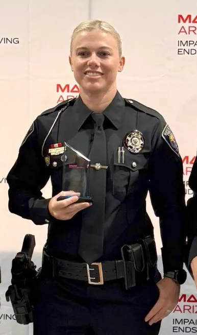 Officer Carri Carrico receiving the MADD Hero award.